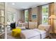 Comfortable sitting room with neutral decor, lounge chairs and plenty of light at 808 Lullwater Ne Rd, Atlanta, GA 30307