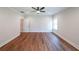 Bright bedroom with hardwood floors, large windows, and a ceiling fan at 82 Lexie Court, Rockmart, GA 30153