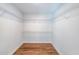 Walk-in closet with wooden floors and wire shelving at 82 Lexie Court, Rockmart, GA 30153
