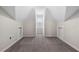 Unique attic room with cozy architecture, neutral carpet, and white trim at 118 Brighton Blvd, Woodstock, GA 30188