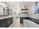 Bathroom offers granite countertops, modern fixtures, and a soaking tub at 118 Brighton Blvd, Woodstock, GA 30188