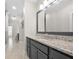 Bathroom features granite countertops, tile floors, and modern fixtures at 118 Brighton Blvd, Woodstock, GA 30188
