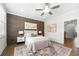 This bedroom is equipped with a ceiling fan and an en-suite bathroom at 118 Brighton Blvd, Woodstock, GA 30188
