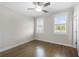 Bright bedroom with natural light from two windows and hardwood floors at 118 Brighton Blvd, Woodstock, GA 30188