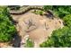 Aerial view of a playground featuring climbing structures and natural play areas at 118 Brighton Blvd, Woodstock, GA 30188