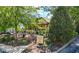 Charming restaurant exterior with lush landscaping and outdoor patio seating at 118 Brighton Blvd, Woodstock, GA 30188