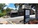 Commercial building with Twin Cedars Plaza sign offering retail and dining options at 118 Brighton Blvd, Woodstock, GA 30188