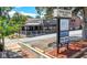 Twin Cedars Plaza retail shops including The Rustic Market, MadLife Stage & Studios, and Mirror Pie Bar at 118 Brighton Blvd, Woodstock, GA 30188
