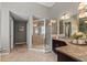 Elegant bathroom featuring a glass-enclosed shower and granite countertops at 134 Lakestone Pkwy, Woodstock, GA 30188