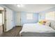 Bright bedroom with a window, offering a cozy spot for relaxation and restful sleep at 3251 Auburn Ave, Dacula, GA 30019