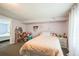 Cozy bedroom with a closet, toys, and a bed, perfect for a to sleep and play at 3251 Auburn Ave, Dacula, GA 30019