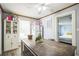 Bright kitchen features a spacious island, modern ceiling fan, and white cabinets, perfect for cooking and entertaining at 3251 Auburn Ave, Dacula, GA 30019