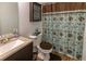 Bathroom featuring a curtained shower and vanity with neutral countertop at 15 Cobblestone Ct, Douglasville, GA 30134