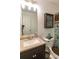 Bathroom featuring a curtained shower and vanity with neutral countertop at 15 Cobblestone Ct, Douglasville, GA 30134