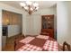 Cozy dining area with wood table, chandelier, and storage cabinet at 15 Cobblestone Ct, Douglasville, GA 30134