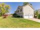 Charming two-story home with a well-manicured lawn and a two-car garage at 15 Cobblestone Ct, Douglasville, GA 30134
