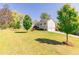 Well-maintained home featuring a spacious front yard and a two-car garage at 15 Cobblestone Ct, Douglasville, GA 30134