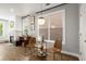 Cozy living room with modern decor, large windows, and stylish furniture at 1744 Habershal Nw Rd, Atlanta, GA 30318