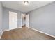 Bedroom featuring gray walls, neutral carpet, and an open closet door at 4413 Pinscher St, Union City, GA 30291