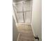 Modern bathroom featuring a glass-enclosed shower with updated shower head and fixtures at 111 Deer Xing, Temple, GA 30179