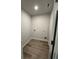 The laundry room has vinyl flooring and a utility sink hook-up at 111 Deer Xing, Temple, GA 30179