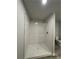 Modern walk-in shower with subway tile and a clear glass partition at 111 Deer Xing, Temple, GA 30179