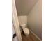 Compact toilet room with essential fixtures, neutral walls, and durable flooring at 111 Deer Xing, Temple, GA 30179