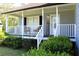 Inviting front porch featuring white railing and a decorative 'Welcome' sign at 3420 Caley Mill Ln, Powder Springs, GA 30127