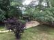 Landscaped backyard features a gazebo sitting area at 3546 Mount Vernon Ct, Lawrenceville, GA 30044