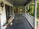 Cozy front porch featuring a swing and decorative elements at 3546 Mount Vernon Ct, Lawrenceville, GA 30044