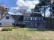 Charming two-story home with beautiful landscaping and a welcoming front porch at 3546 Mount Vernon Ct, Lawrenceville, GA 30044