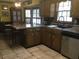 Traditional kitchen with breakfast bar, stainless steel appliances, and ample counter space at 3546 Mount Vernon Ct, Lawrenceville, GA 30044