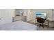 Bedroom with bed, dresser, and desk; offering a comfortable space for sleep and work at 5123 Tulip Sq, Acworth, GA 30101