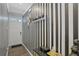 Stylish hallway with bold striped wallpaper, modern decor, and access to other rooms at 5123 Tulip Sq, Acworth, GA 30101