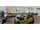 Cozy living room featuring trendy seating, a dining area, and an entertainment center at 5123 Tulip Sq, Acworth, GA 30101