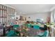 Open-concept living space with a kitchen bar, adjacent living room and eclectic decor throughout at 5123 Tulip Sq, Acworth, GA 30101
