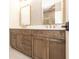 Bathroom showcasing a stylish vanity with double sinks and elegant gold fixtures at 560 Fisher Dr # 48, Alpharetta, GA 30009