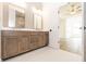 Spacious bathroom with double sink vanity, modern mirrors and fixtures at 560 Fisher Dr # 48, Alpharetta, GA 30009