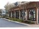 Street view of Cafe Intermezzo featuring outdoor seating, pillars, and arched windows at 560 Fisher Dr # 48, Alpharetta, GA 30009