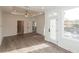 Spacious living room with hardwood floors, tray ceiling, and lots of natural light at 560 Fisher Dr # 48, Alpharetta, GA 30009