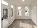 Open concept living area with hardwood floors and lots of natural light at 560 Fisher Dr # 48, Alpharetta, GA 30009