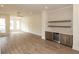 Bright, open floor plan boasts wood floors and a bar area with a wine cooler at 560 Fisher Dr # 48, Alpharetta, GA 30009