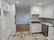 Kitchen featuring white cabinets, granite countertops, and stainless steel appliances at 6419 Edenfield Dr, Lithonia, GA 30058