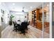 This conference room features a large table, executive chairs, and custom built-in shelving at 1074 Peachtree Ne Walk # 115, Atlanta, GA 30309
