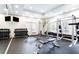 A comprehensive fitness center has weightlifting equipment and mirrored walls for a full body workout at 1074 Peachtree Ne Walk # 115, Atlanta, GA 30309