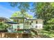 Backyard view showcasing the manicured landscaping, seating areas, and the home's architecture at 1424 Adele Sw Ave, Atlanta, GA 30314