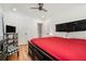 Spacious bedroom featuring hardwood floors, modern decor, and a large, comfortable bed at 1424 Adele Sw Ave, Atlanta, GA 30314