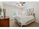 Light-filled bedroom featuring neutral colors, a comfortable bed, and a large window at 2759 Arbor Se Ave, Atlanta, GA 30317