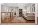 Second floor bonus room featuring hardwood floors, a comfortable seating area, and view of the home's interior at 2759 Arbor Se Ave, Atlanta, GA 30317