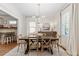 Sun-filled dining room with wooden table and chairs, adjacent to the kitchen at 2759 Arbor Se Ave, Atlanta, GA 30317